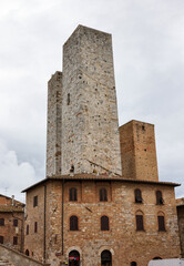 Naklejka premium The Salvucci Towers, also called the Twin Towers in the old town of San Gimignano, Tuscany, Italy