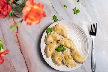 Traditional homemade Polish pierogi with caramelised onion. 