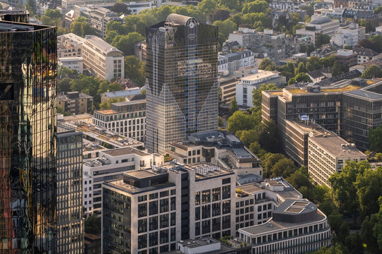 Frankfurt Germany skyline cityscape with modern skyscraper architecture and finance towers across the urban center in calm daylight over a growing city