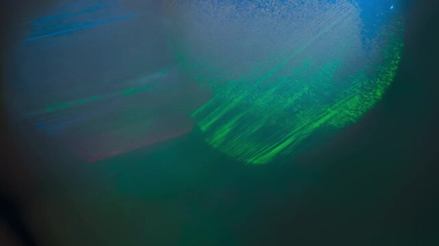 Reflection of High Energy Laser Photons. A chaotic flickering of multi-colored reflections caused by lasers of different frequencies passing through a crystalline form