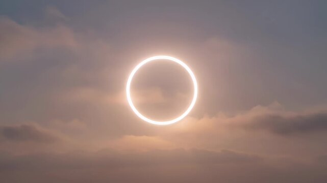 Captivating annular solar eclipse illuminating the sky amidst swirling clouds at sunset