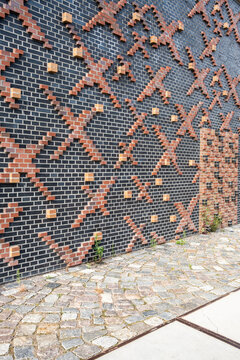 Urban brick texture shows abstract architecture facade wall pattern and geometry creating minimal detail for contemporary exterior background