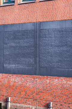 Urban minimal geometry highlights abstract architecture facade in brick concrete texture delivering clean detail for contemporary exterior surfaces
