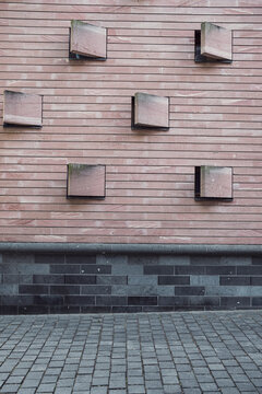 Urban brick texture forms abstract wall pattern with minimal squares and strong detail for contemporary architecture background and surface design