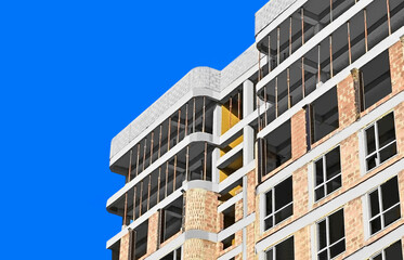 Building construction site with scaffolding