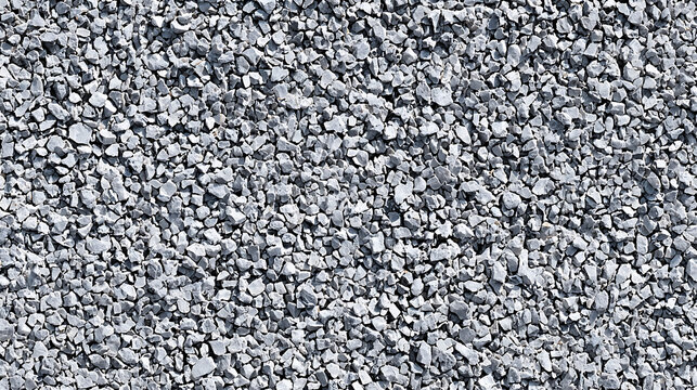 Seamless texture of small grey gravel stones rock background