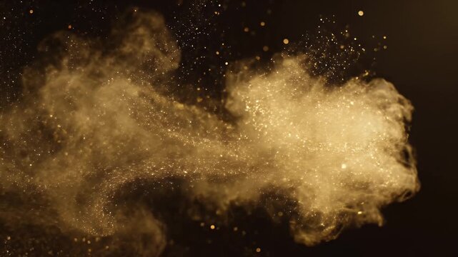 An abstract image features a golden cloud-like shape with sparkling particles on a black background
