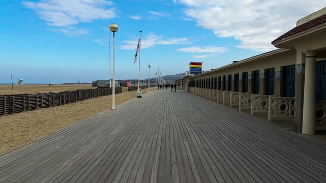 Changing booths bearing the names of Hollywood actors line the boardwalk promenade Les Planches in Deauville, France, October 20, 2025. High quality 4k footage