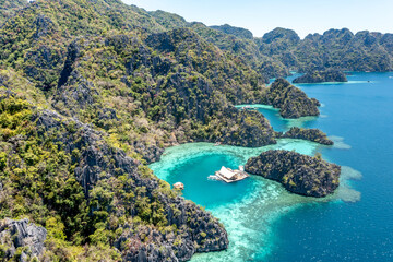 Fototapeta premium Drone wide shot tropical islands and turquoise water Coron Palawan