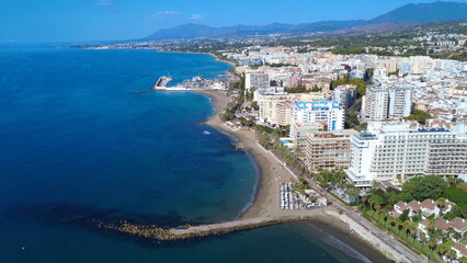Fototapeta premium Marbella, Spain: Seafront with Beach and Town