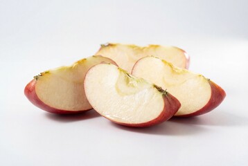 Fresh red apple slices isolated on a white background