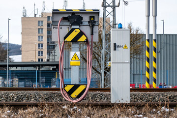 Train charging station at the track