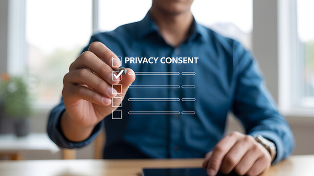 Man giving privacy consent with digital checkmark on virtual form at office desk by window