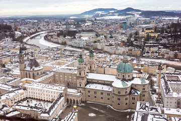 Winter view over Salzburg with Salzach River and alpine mountains from the Hohensalzburg Fortress