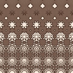A pattern of brown and white flowers. The flowers are in different sizes and shapes. The pattern is made up of many small flowers