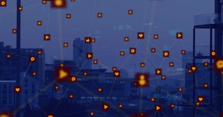 Floating digital network overlay lighting urban skyline at dusk, with orange icons and glass tower