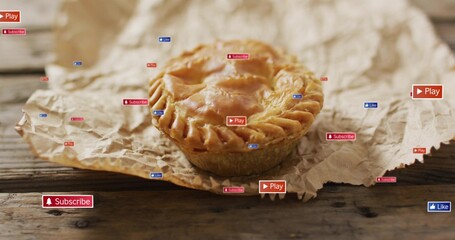 Resting golden hand pie shining on crumpled parchment on rustic plank, Subscribe Play Like badges