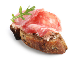 Delicious bruschetta with salami sausage, cream cheese and arugula isolated on white
