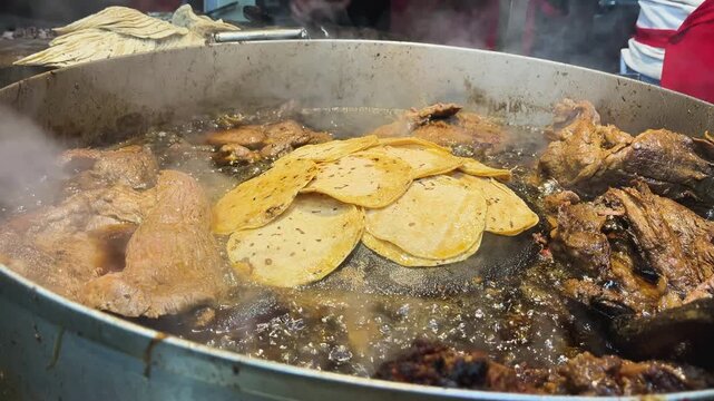 Close-up shot of traditional Mexican street tacos with suadero and longanisa meat being prepared on a griddle. Authentic culinary experience in CDMX