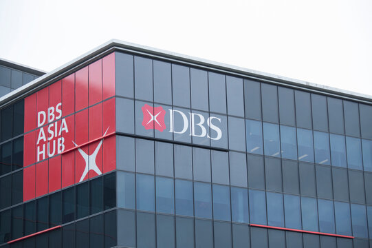 Exterior of DBS Asia Hub, Singapore. Modern glass corporate headquarters of a leading Asian bank, symbolizing finance, business growth, and regional economic strength