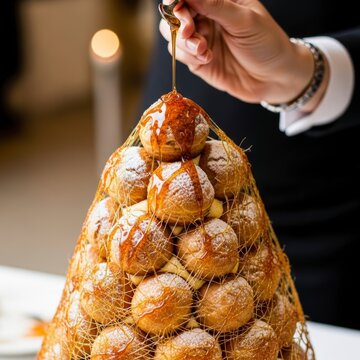 Chef Preparing Croquembouche for Celebration.