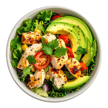 Overhead view of delicious chicken salad with avocado and tomatoes in a bowl isolated on white background