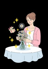 女性は花束を飾る