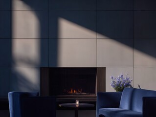 Naklejka premium Blue Velvet Sofa and Armchair Seating Area in a Luxury Hotel Lobby with Modern Fireplace and Dramatic Sunlight Shadows for Interior Design Background and Copy Space