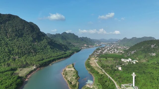 Phong Nha &ndash; Ke Bang National Park, Bo Trach, Quang Binh, Central Vietnam &ndash; 4K aerial footage of UNESCO Heritage site with Son River, limestone karst mountains, rice fields, tropical forest & cave