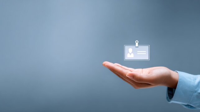 Concept of employee ID card, a hand with an ID card and blue background. Representing access and security