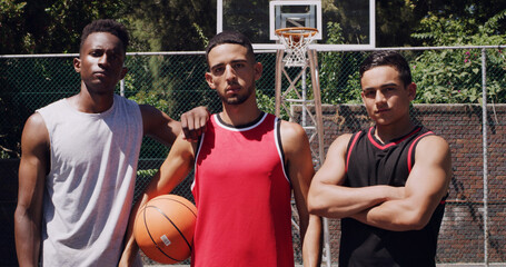 Confidence, portrait or men on basketball court with ball, fitness hobby or teamwork in weekend match. Pride, collaboration or players with roundball, hoop competition or training support in New York © peopleimages.com