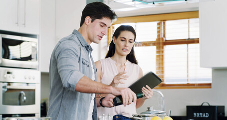 Home, cooking and couple in kitchen, tablet for online instructions and digital app for recipe...