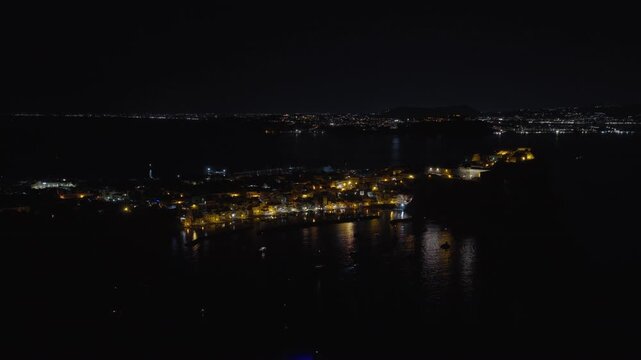 Procida in the Gulf of Naples illuminated at night in Italy