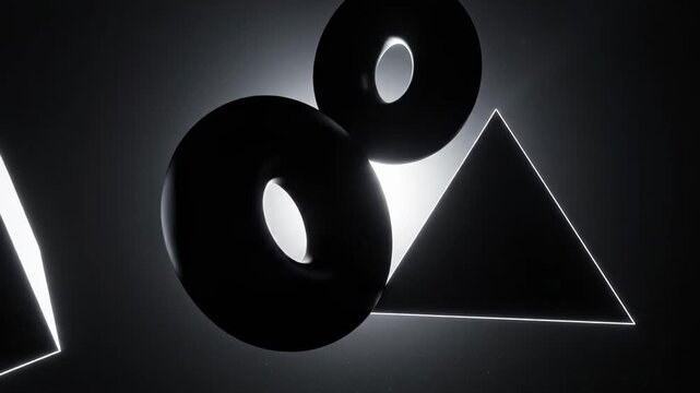 Geometric Shapes Rotating in Spotlight.