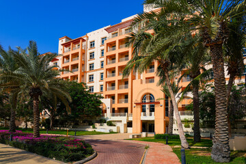 Fototapeta premium Modern residential apartment complex with Mediterranean architecture in King Abdullah Economic City (KAEC), Saudi Arabia