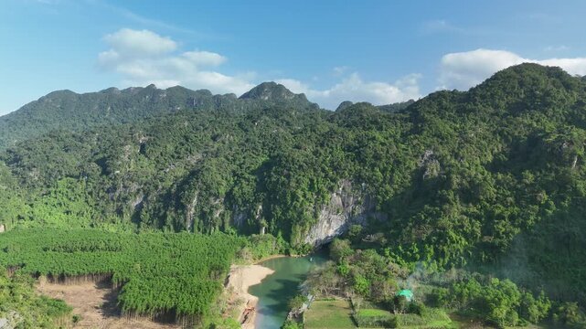 Phong Nha &ndash; Ke Bang National Park, Bo Trach, Quang Binh, Central Vietnam &ndash; 4K aerial footage of UNESCO Heritage site with Son River, limestone karst mountains, rice fields, tropical forest & cave