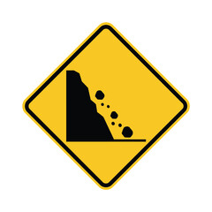 Yellow diamond warning sign indicating falling rocks from a cliff, a common road hazard symbol for drivers.
