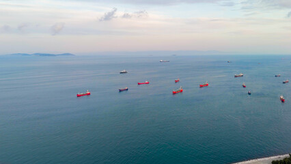 Istanbul, Turkey. Ships wait in line to pass through the Bosphorus Strait. The Sea of Marmara. Cloudy weather at sunset., Aerial View