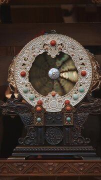 Chengdu, Sichuan, China. Dharmachakra Wheel Or Wheel Of Dharma Is Symbol Used In Dharmic Religions. Dhammacakka Widespread Use In Buddhism. Symbol Of Buddhist Religion. Dharmachakra Use As Decoration