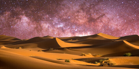 night landscape with desert dunes, starry sky and milky way in desert, abstract background.
