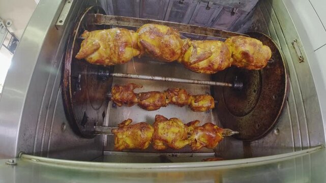 Broaster Chicken Fish eye view while they turn around for a better cooking