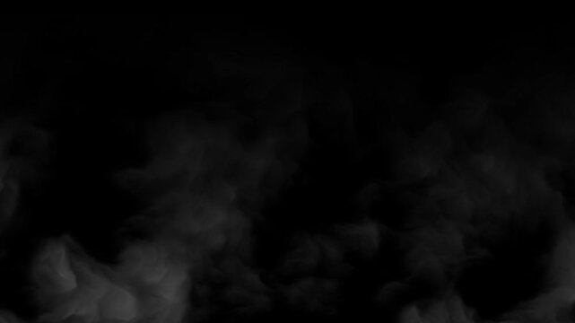 Dramatic smoke rising against dark background