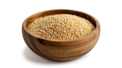 A beautiful wooden bowl is filled to the brim with uncooked quinoa on a white background.