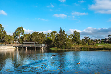 Residents and visitors experience suburban street life and community spaces in Oran Park Town, NSW, Australia, February 5, 2026