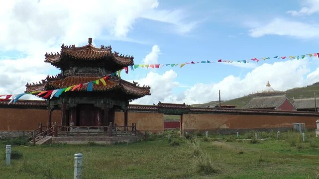 MONGOLIA, SELENGE - September 5, 2013: The territory of the Amarbayasgalant Mongolian Buddhist monastery and ritual objects on an autumn cloudy day.