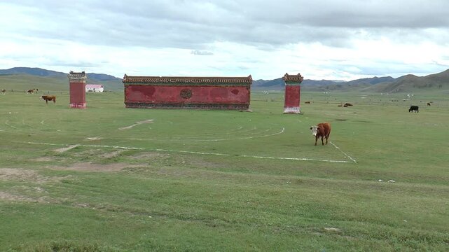 MONGOLIA, SELENGE - September 5, 2013: The territory of the Amarbayasgalant Mongolian Buddhist monastery and ritual objects on an autumn cloudy day.