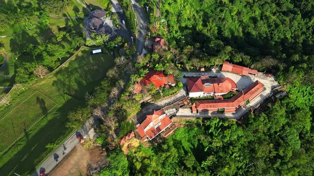 Top view landscape frame capturing the whole church and half shot of Arillo El kabayo and mountains and cultivated farmland at Don Bosco Chapel of the Hill Batulao Nasugbo Batangas Philippines