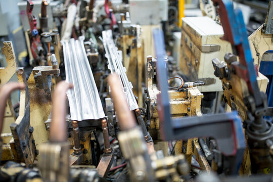 Close-up of components in a car factory
