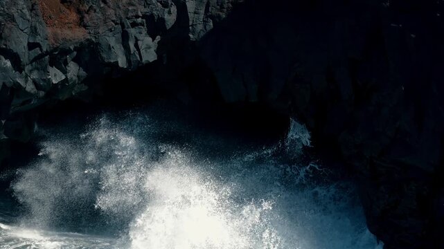 Slow motion waves crash on basalt in Canary Islands
