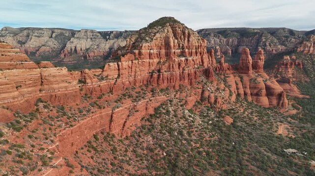 beauitful mountain drone footage panning to the right of an epic mountain valley in sedona arizona